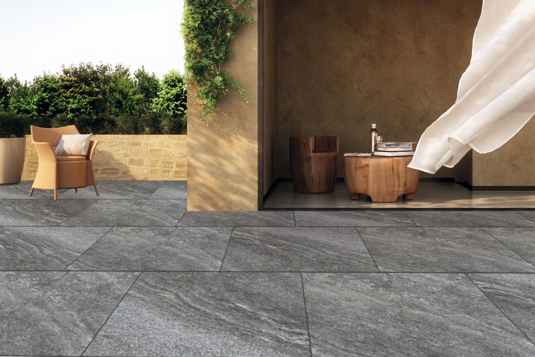 large square porcelain pavers in a natural stone look raven colour