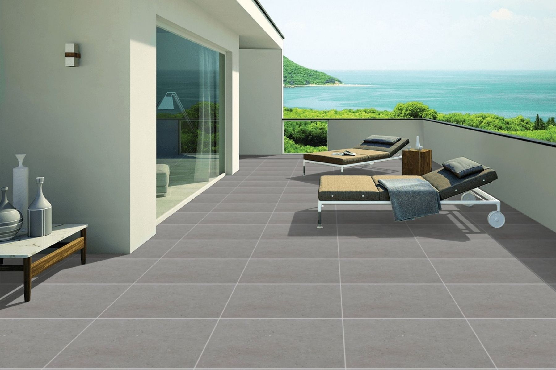 outdoor balcony tiled with modern grey procelain pavers